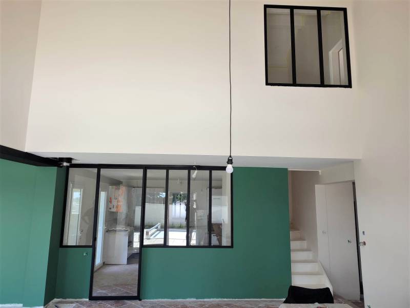 Fabrication sur mesure d'une verrière et porte coulissante sur la commune de Beynost 01700